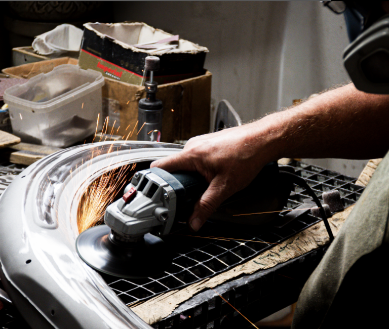Grinding the surface of a part